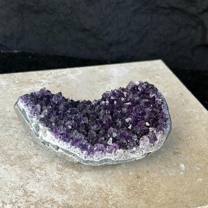 Flat amethyst raw purple crystal cluster