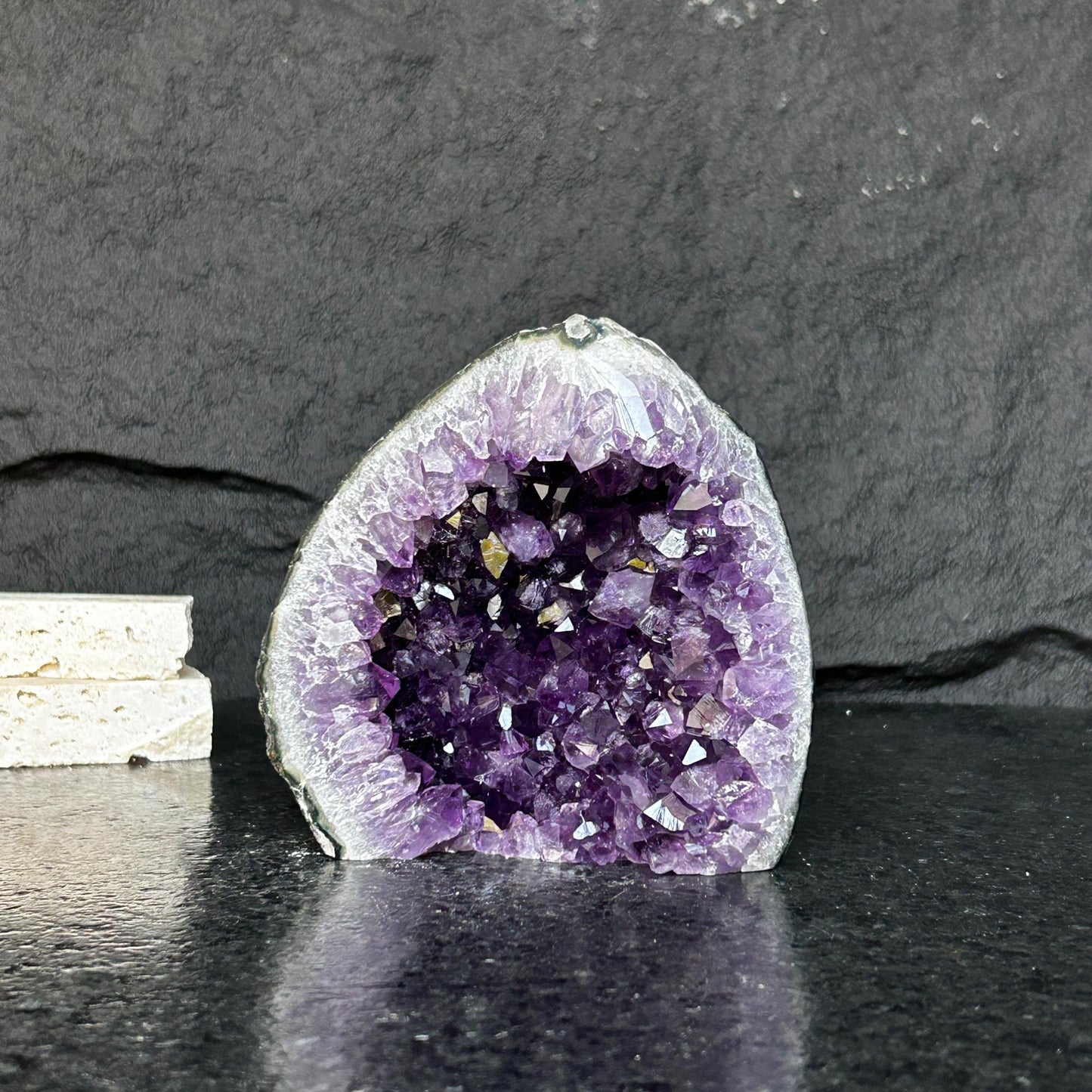 Amethyst stone agate edges, crystal geode from Uruguay, cut base self standing stone