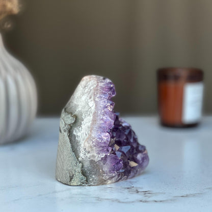 Strange specimen Amethyst geode, raw purple crystal cluster