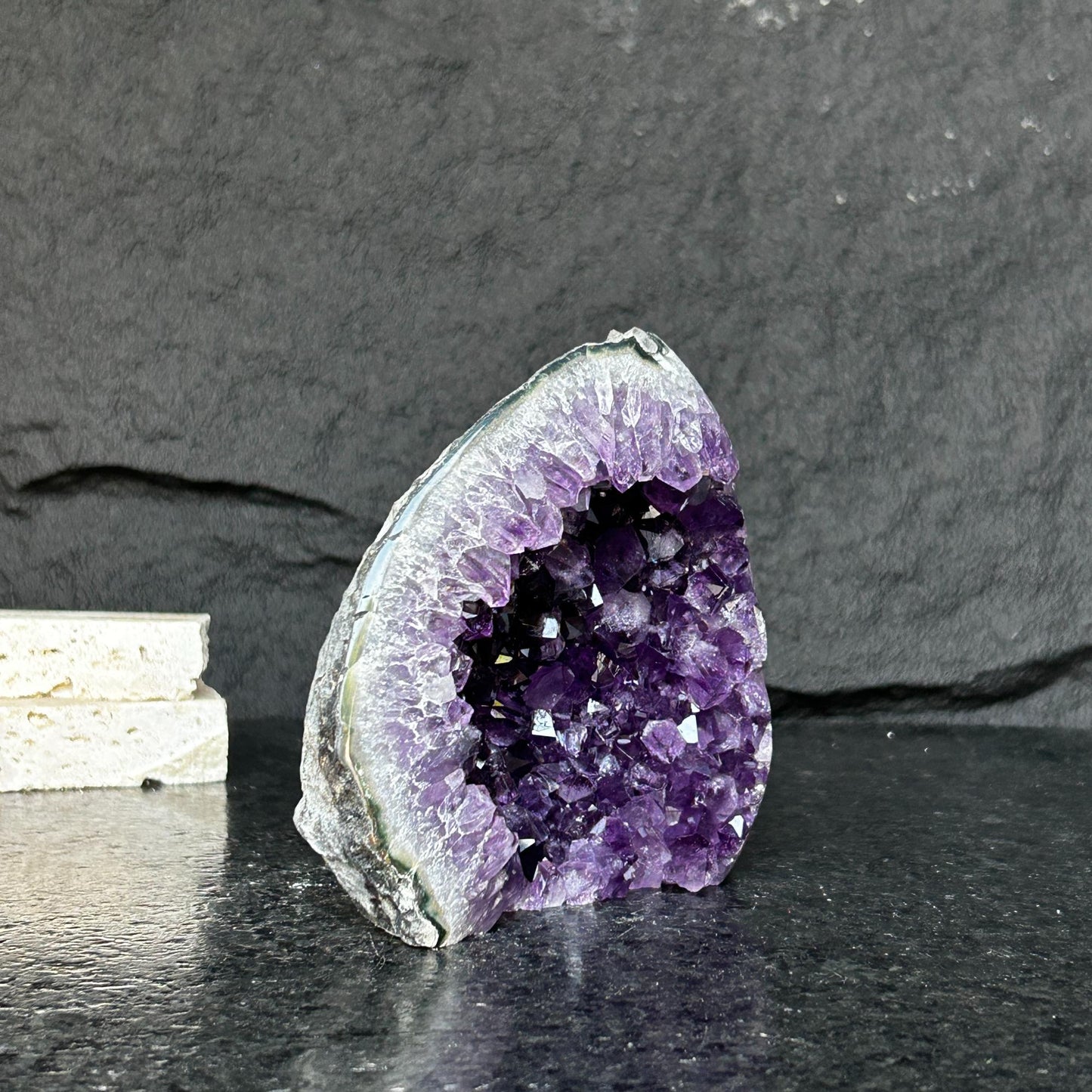 Amethyst stone agate edges, crystal geode from Uruguay, cut base self standing stone