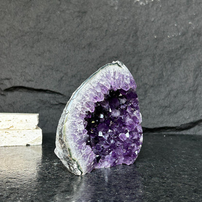 Amethyst stone agate edges, crystal geode from Uruguay, cut base self standing stone