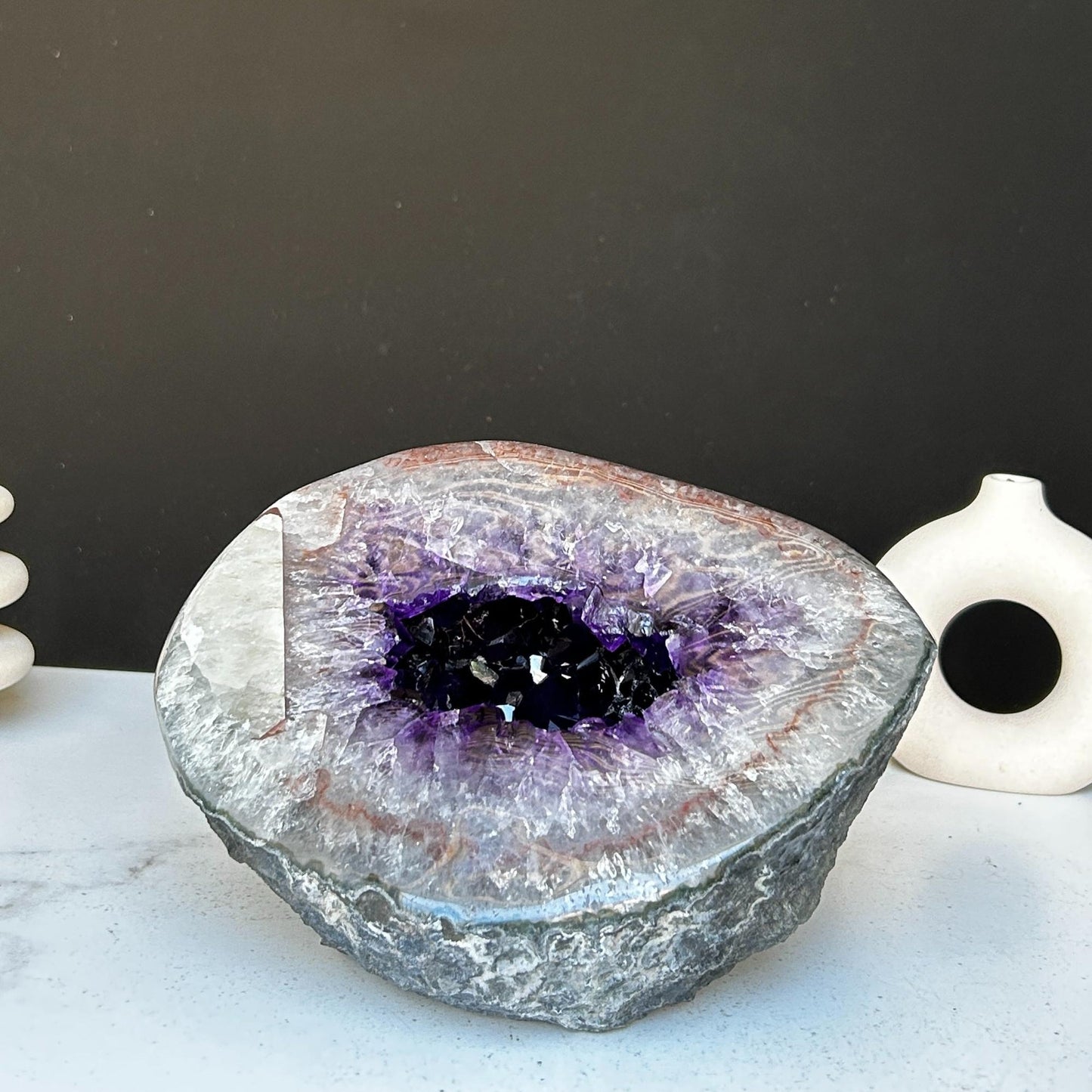 Amethyst gemstone, amethyst and quartz geode